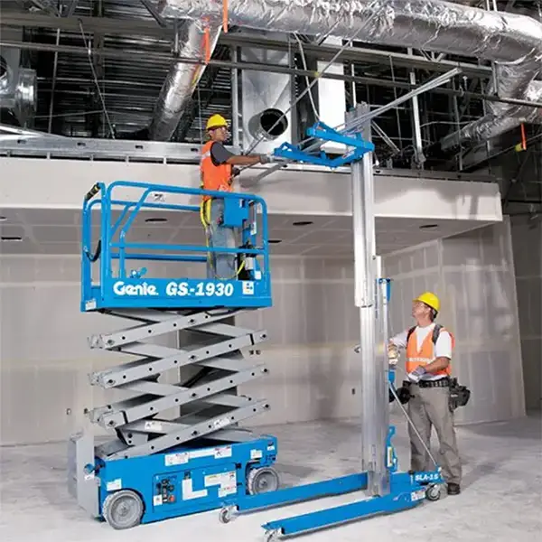 Scissor Lift Rental - Two Men Working Indoors Using Genie GS-1930 Electric Scissor Lift