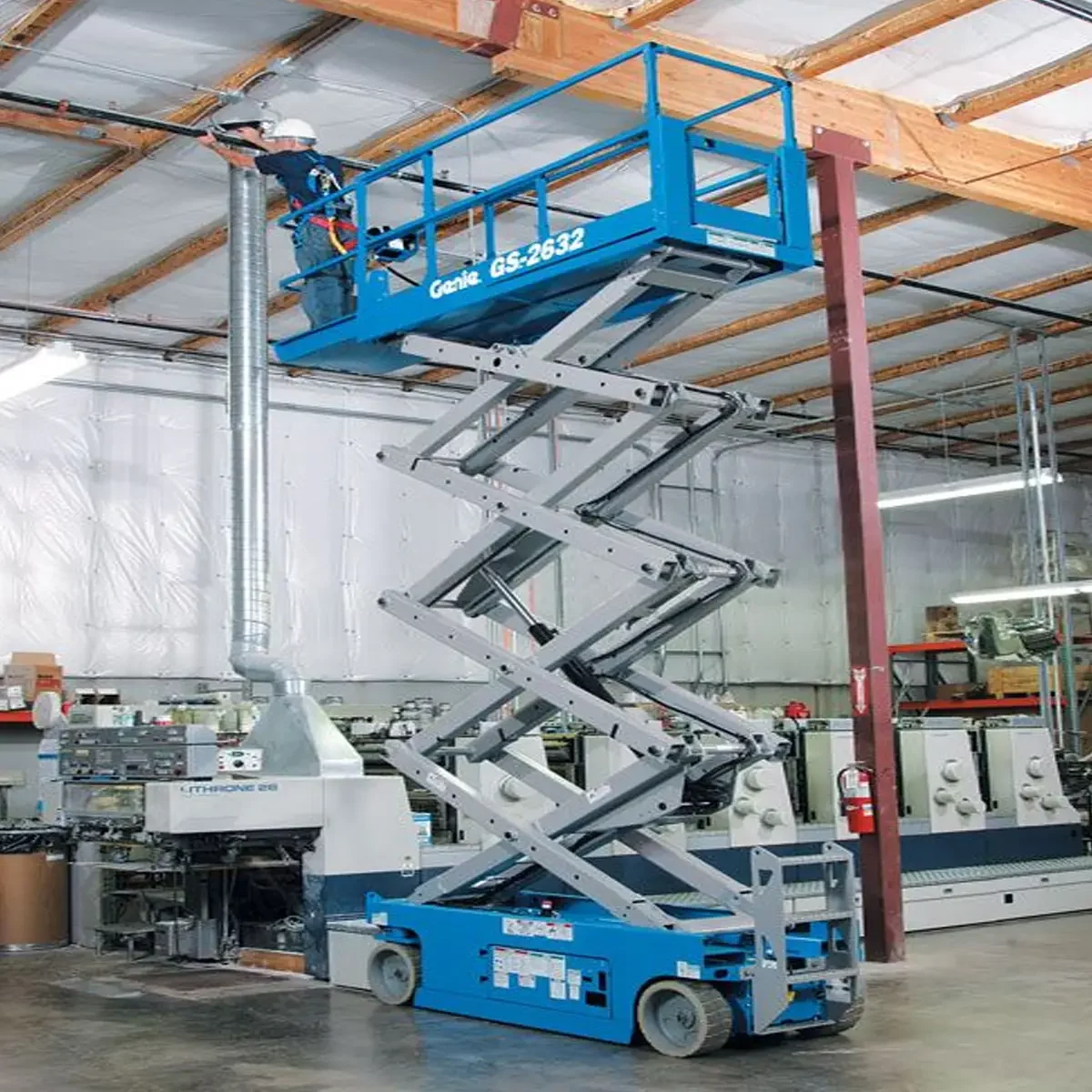 GS-2632-E-Drive-Electric-Scissor-Lift-Working-with-extended-deck