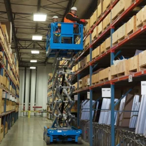 GS-4046-E-Drive-Electric-Scissor-Lift-Operating-in-a-warehouse