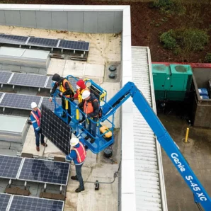 S-45-XC-Telescopic-Boom-Lift-Working-with-solar-panels-on-roof