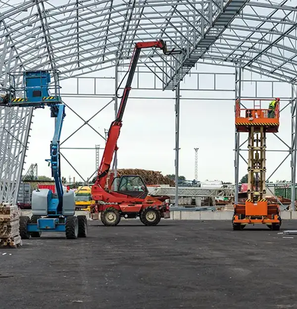 Different types of MEWPs including cherry pickers and scissor lifts for various industries.