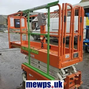 MHA Universal Board Carrier Attachment securely fitted on a scissor lift transporting large flat boards at height.